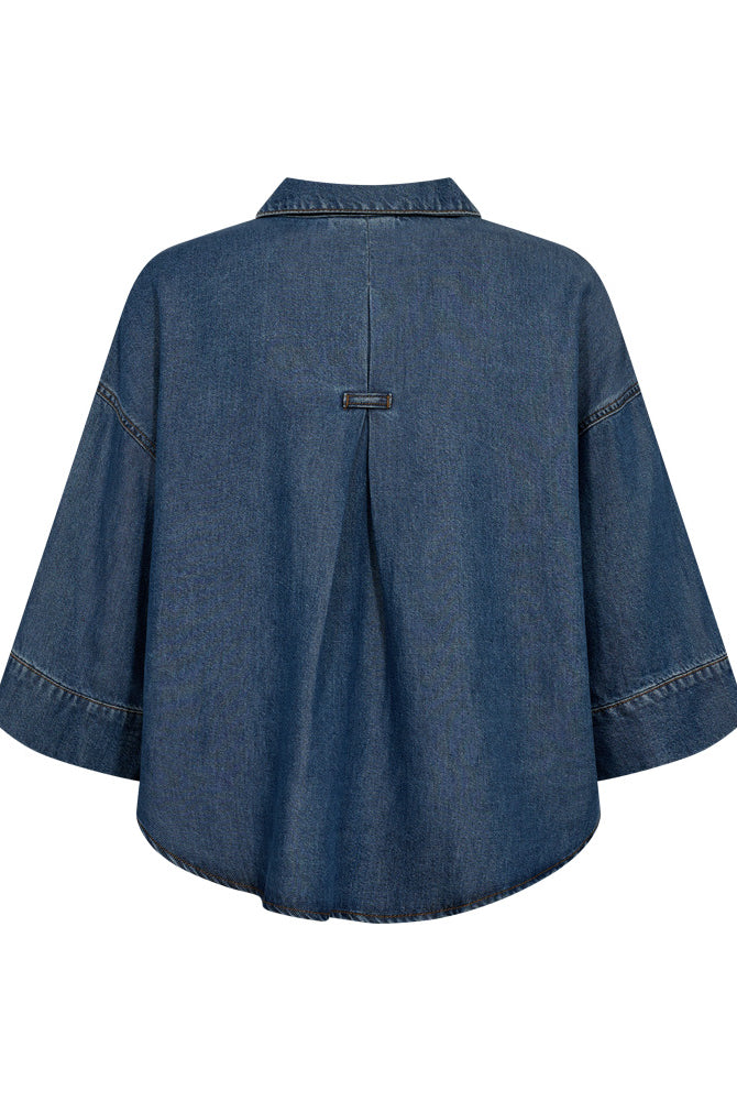 https://content.storeinfo.nl/applicatie/img/978/20260329141244_2407105_packshot22078431155Back1FQMILOSHIRTMediumBlueDenim.jpg
