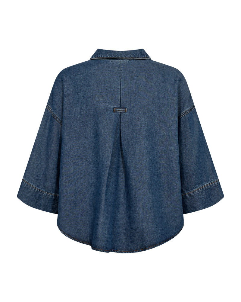 https://content.storeinfo.nl/applicatie/img/978/20260329141244_2407105_packshot22078431155Back1FQMILOSHIRTMediumBlueDenim.jpg