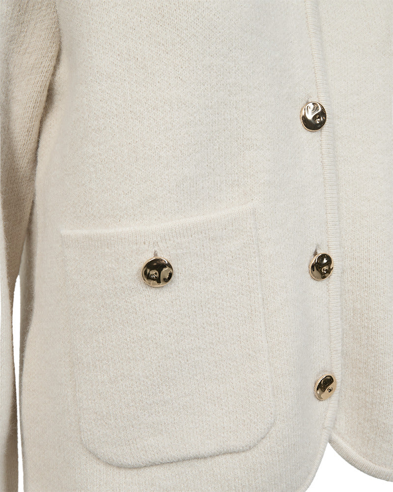 https://content.storeinfo.nl/applicatie/img/978/20261017121740_708368_packshot22073242080Details1FQZANA-CARDIGAN-Moonbeam.jpg