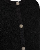 https://content.storeinfo.nl/applicatie/img/978/20250910121909_2501840_packshot22067271000Details1FQGRSCHRISTACARDIGANBlack.jpg