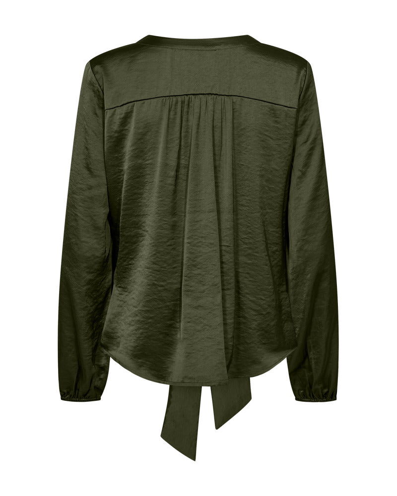 https://content.storeinfo.nl/applicatie/img/978/20251004153836_1770688_packshot22075793081Back1FQDOVEBLOUSEKombuGreen.jpg