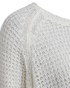 https://content.storeinfo.nl/applicatie/img/978/20260306142806_1654722_packshot22081241400Details1FQZAPPERPULLOVERStarOffwhite.jpg