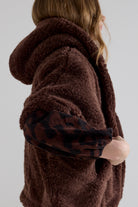 https://content.storeinfo.nl/applicatie/img/978/20260821174521_898677_Tramontanahoodedcapefaucfur3.jpg